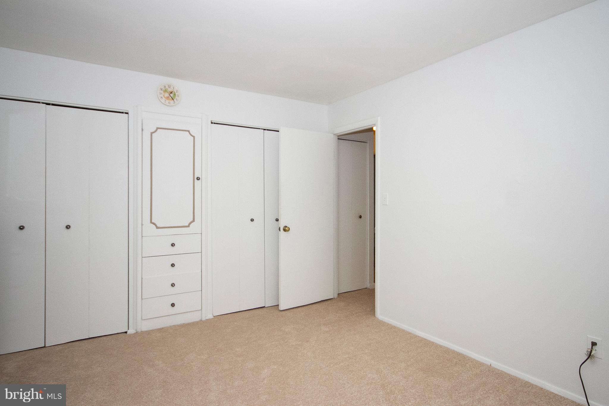 4213 Haycoke Road Baltimore, MD 21236 - Photo 17 of 30 MASTER BEDROOM WITH BUILT-INS FOR EXTRA STORAGE