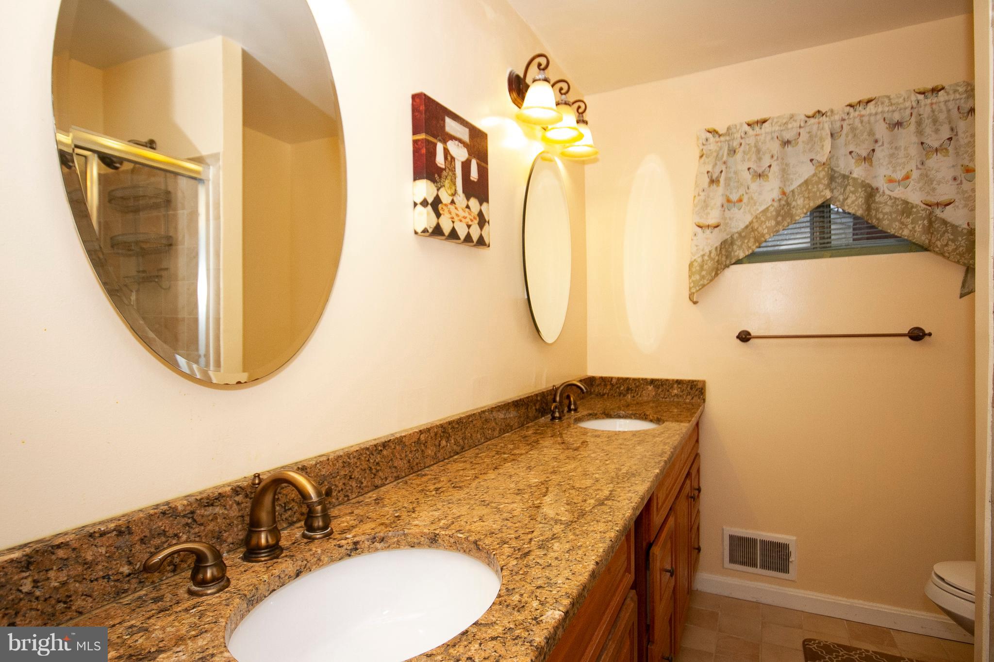 4213 Haycoke Road Baltimore, MD 21236 - Photo 18 of 30 NEWLY REMODELED HALL BATH W/GRANITE DOUBLE VANITY