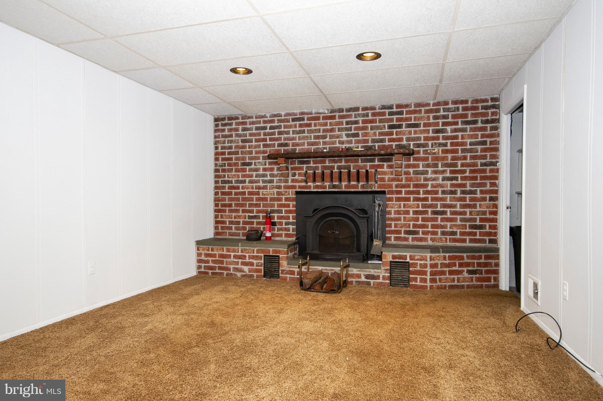 4213 Haycoke Road Baltimore, MD 21236 - Photo 20 of 30 LOWER LEVEL FAMILY ROOM W/BRICK CUSTOM FIREPLACE