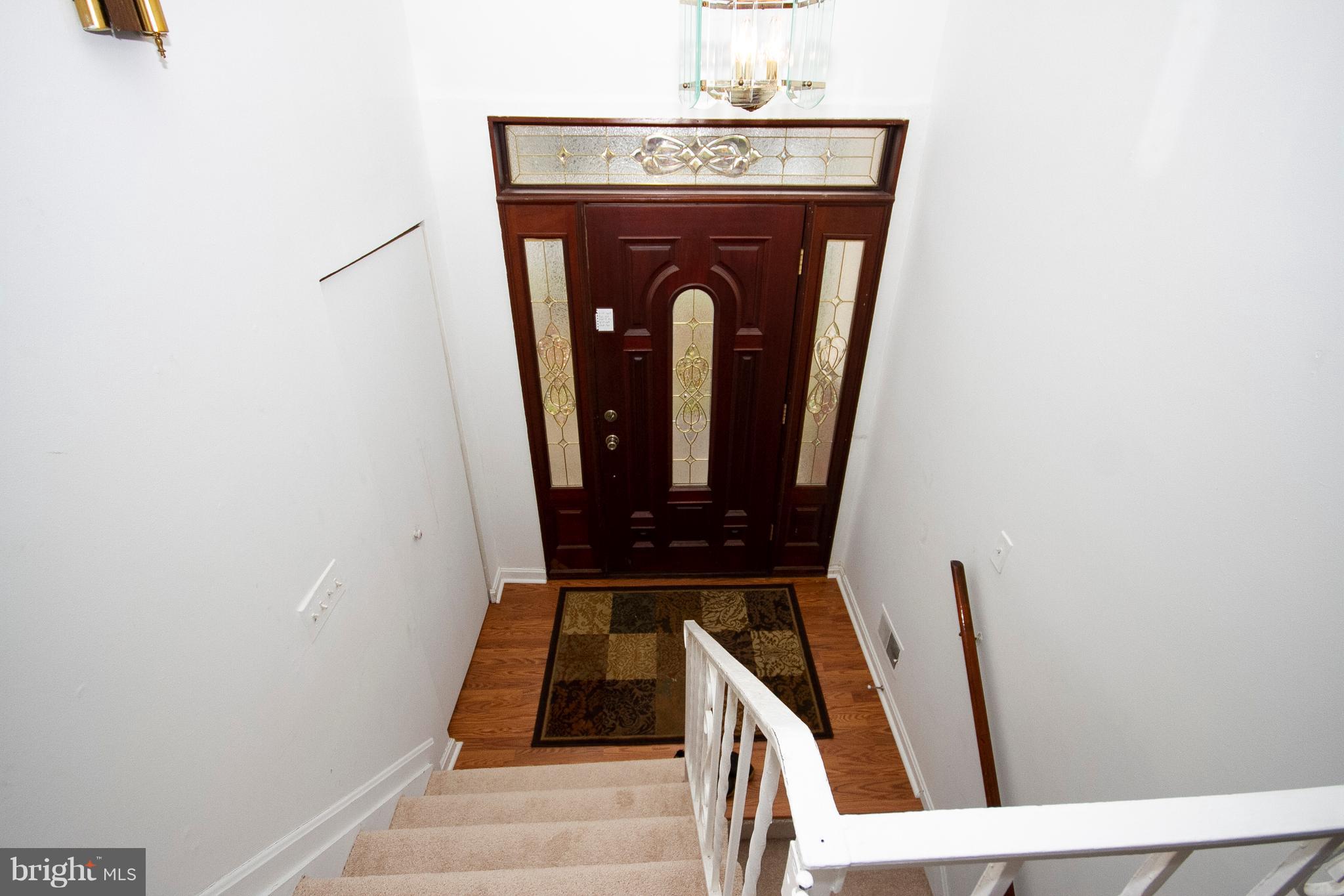 4213 Haycoke Road Baltimore, MD 21236 - Photo 3 of 30 LOVELY ENTRANCE/ FOYER WITH NEW WOOD FLOOR