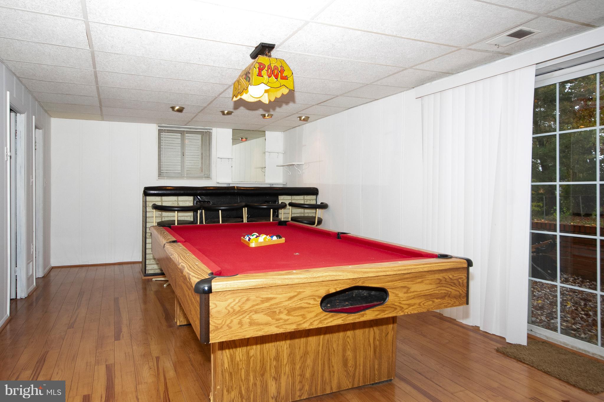 4213 Haycoke Road Baltimore, MD 21236 - Photo 21 of 30 GAME ROOM AREA WITH NEW WOOD FLOORS