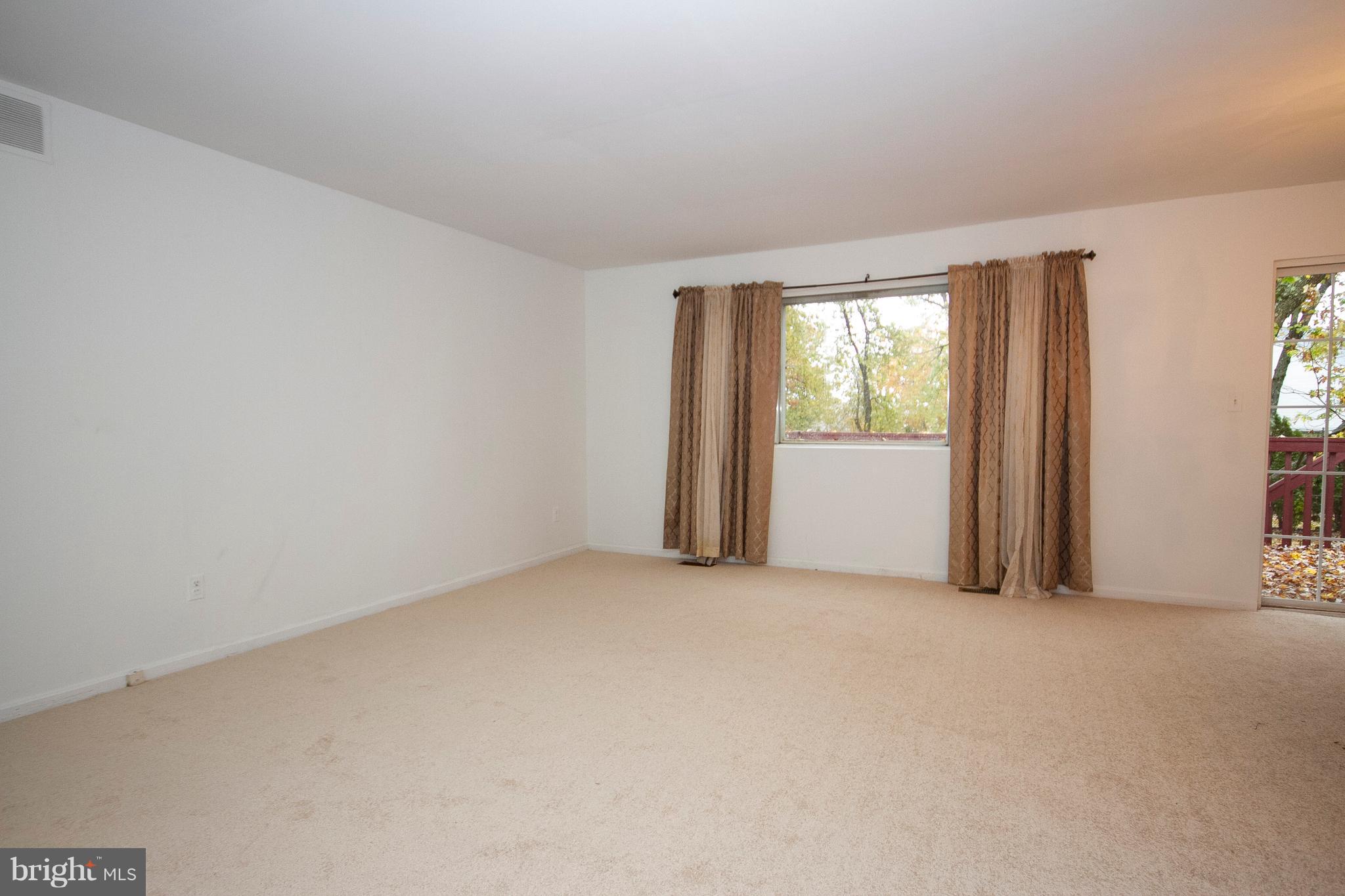 4213 Haycoke Road Baltimore, MD 21236 - Photo 8 of 30 BRIGHT AND SPACIOUS FORMAL LIVING ROOM