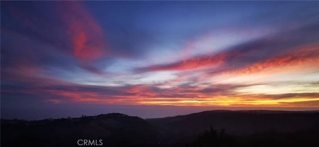 a view of balcony and yard