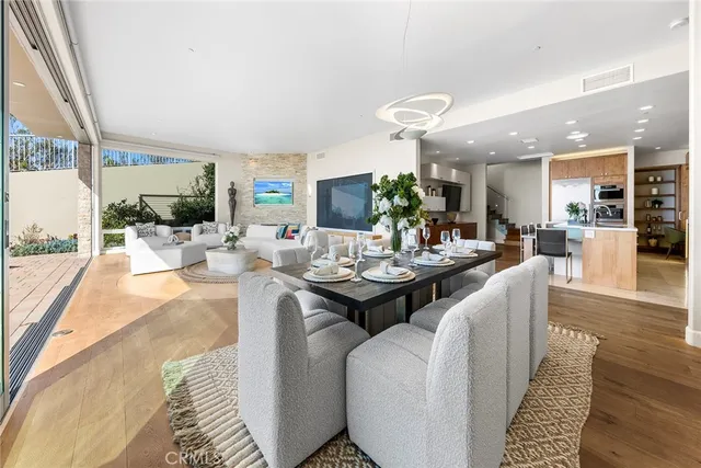 an aerial view of house with a swimming pool yard and outdoor seating