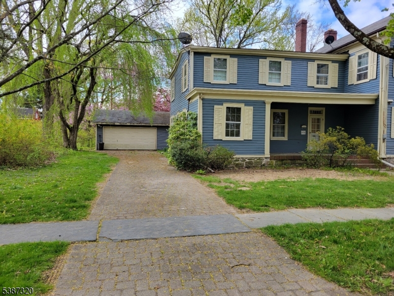 504 3rd Street Belvidere, NJ 07823 - Photo 2 of 13 a front view of a house with garden
