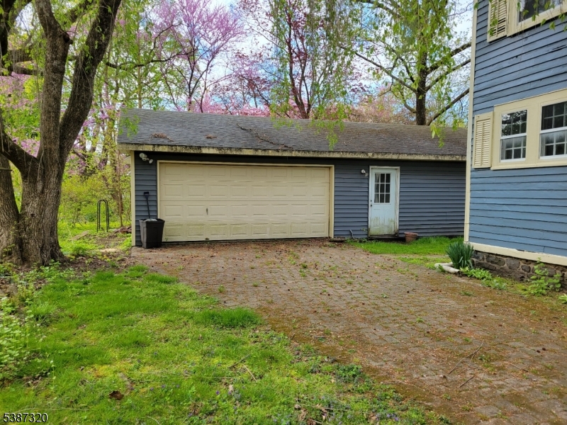 504 3rd Street Belvidere, NJ 07823 - Photo 3 of 13 a front view of a house with a garden