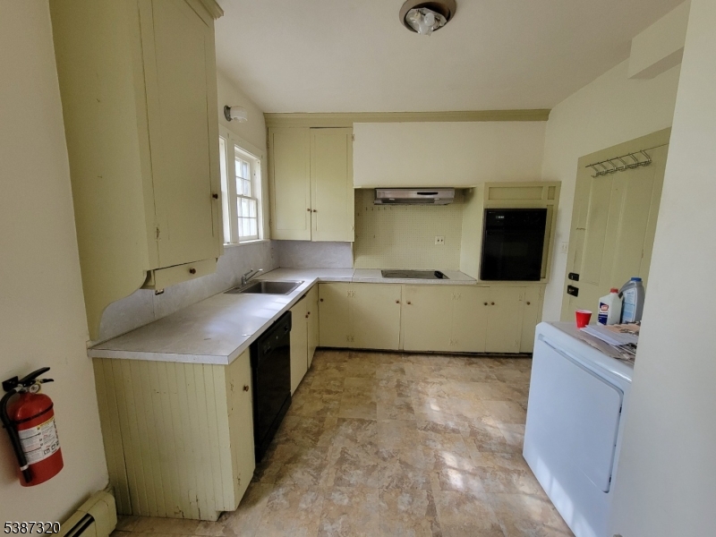 504 3rd Street Belvidere, NJ 07823 - Photo 4 of 13 a view of utility room with two washing machine