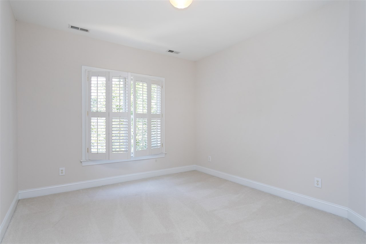 1904 Capers Court Raleigh, NC 27612 - Photo 22 of 29 Second bedroom is upstairs and has a large closet and plantation shutters Bedroom