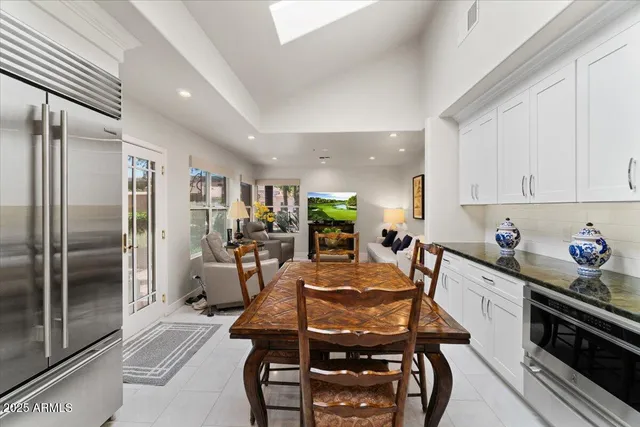 a view of a dining room with furniture