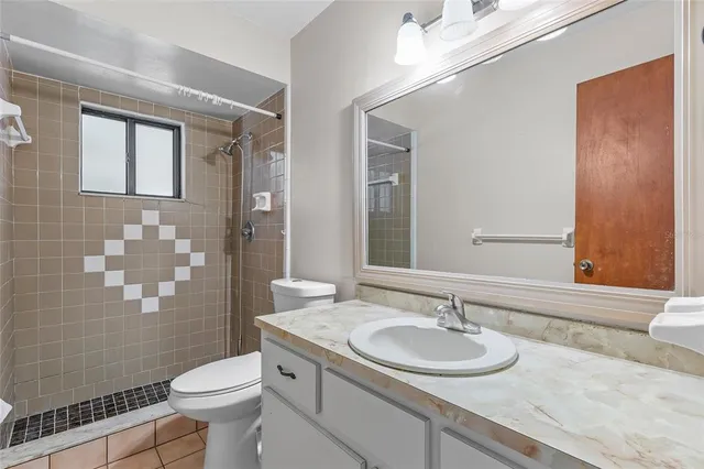 a view of a livingroom with a ceiling fan