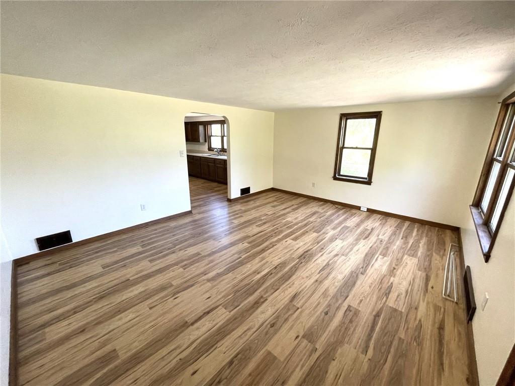 436 East Slippery Rock Road Chicora, PA 16025 - Photo 12 of 40 wooden floor in an empty room with a window