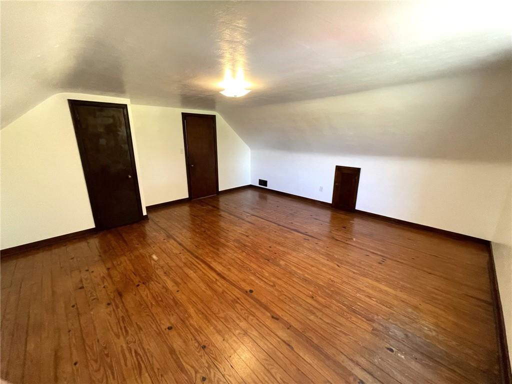 436 East Slippery Rock Road Chicora, PA 16025 - Photo 16 of 40 a view of an empty room with wooden floor