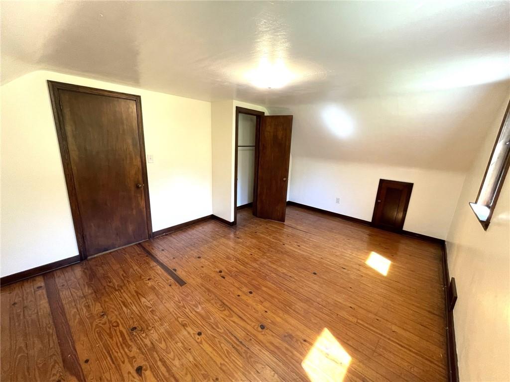 436 East Slippery Rock Road Chicora, PA 16025 - Photo 18 of 40 an empty room with wooden floor and closet