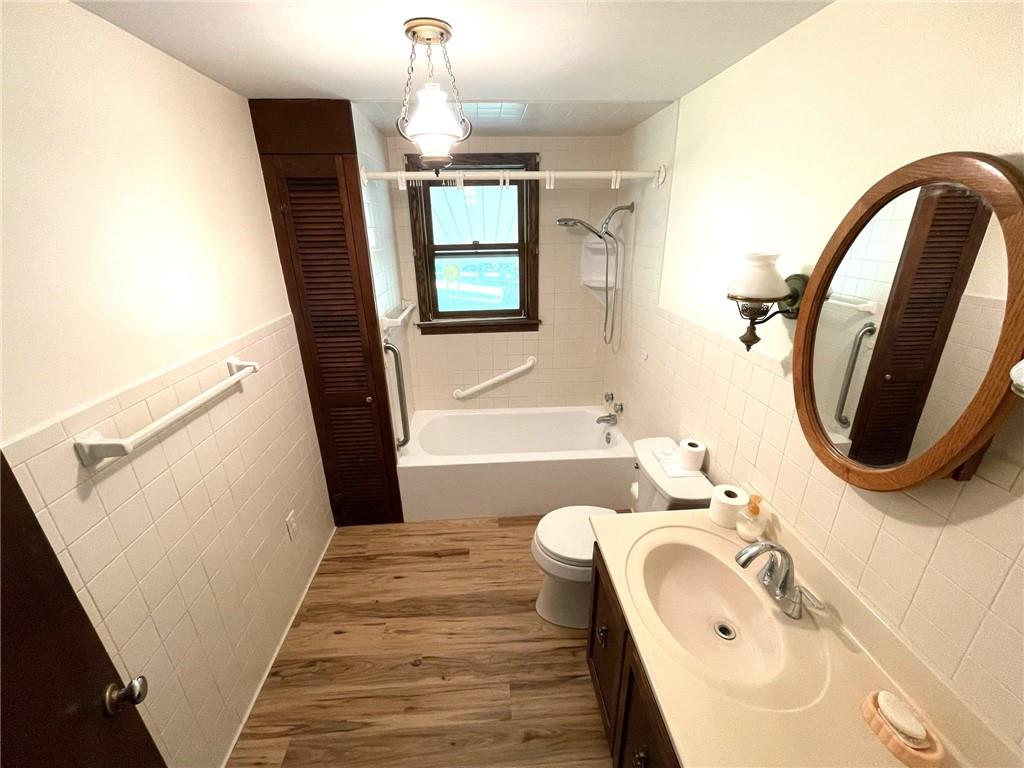 436 East Slippery Rock Road Chicora, PA 16025 - Photo 19 of 40 a bathroom with a sink a toilet and bathtub