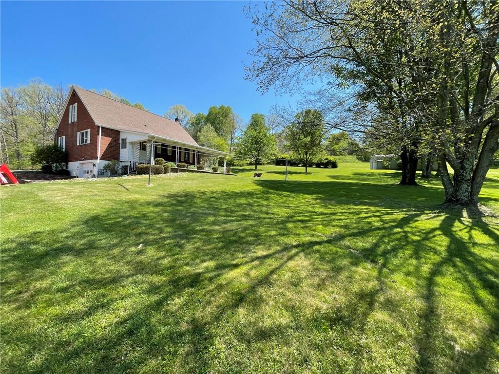 436 East Slippery Rock Road Chicora, PA 16025 - Photo 27 of 40 a front view of a house with a yard