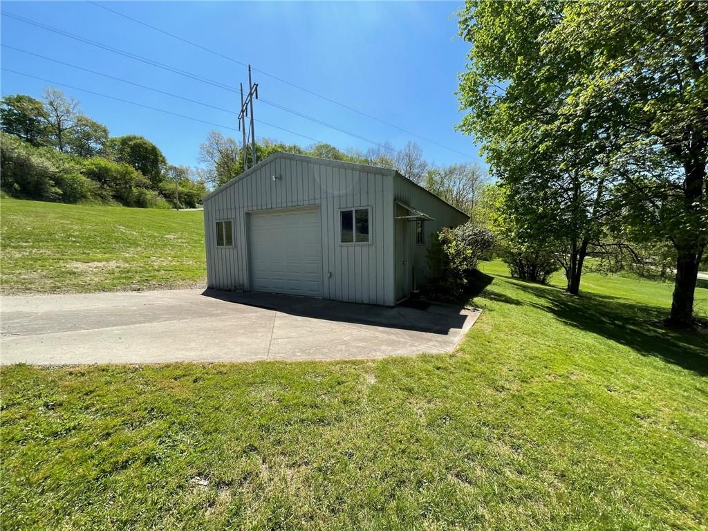 436 East Slippery Rock Road Chicora, PA 16025 - Photo 30 of 40 a front view of a house with yard and green space