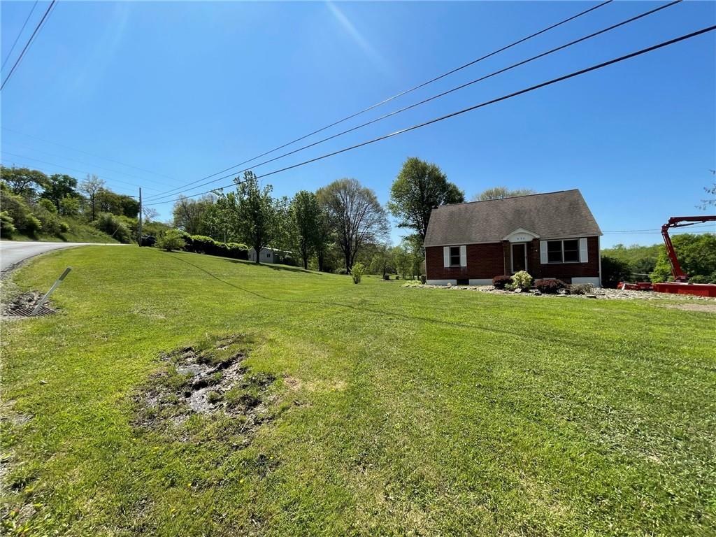436 East Slippery Rock Road Chicora, PA 16025 - Photo 3 of 40 a view of a house with a yard
