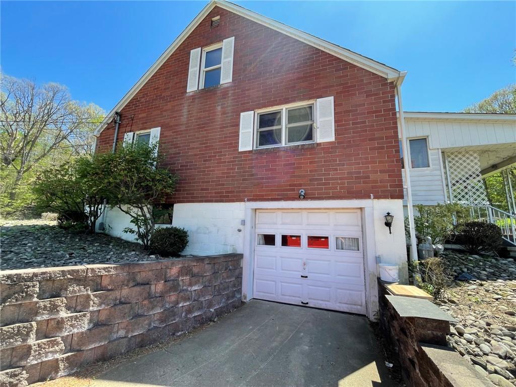 436 East Slippery Rock Road Chicora, PA 16025 - Photo 6 of 40 a front view of a house with a yard