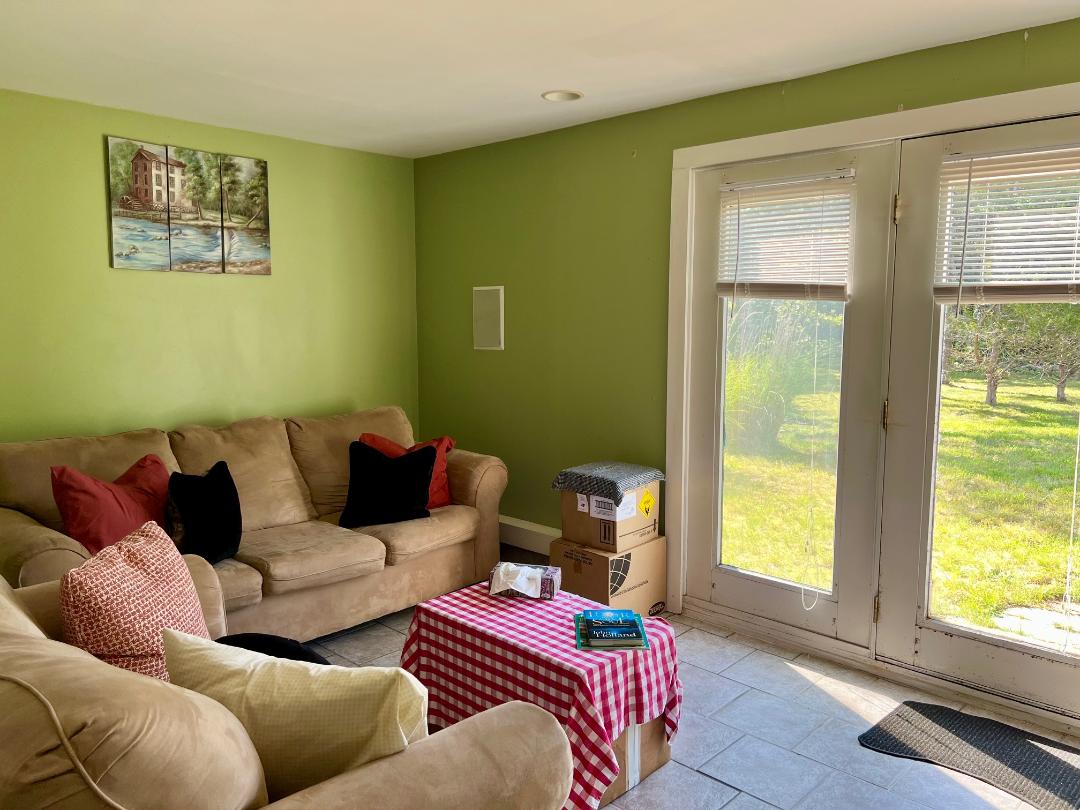 2 Farmers Road Edgartown, MA 02539 - Photo 16 of 27 a living room with furniture and a window