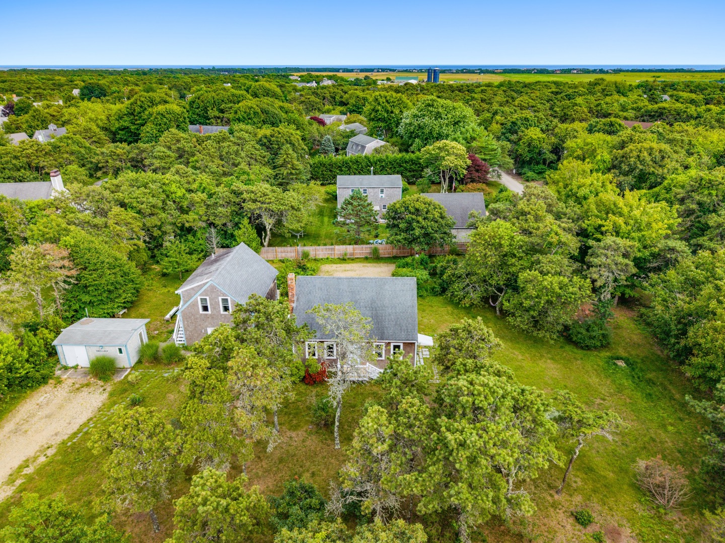 2 Farmers Road Edgartown, MA 02539 - Photo 6 of 27 a view of a garden with an outdoor space