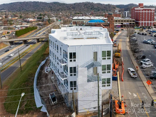 a front view of a building with street view