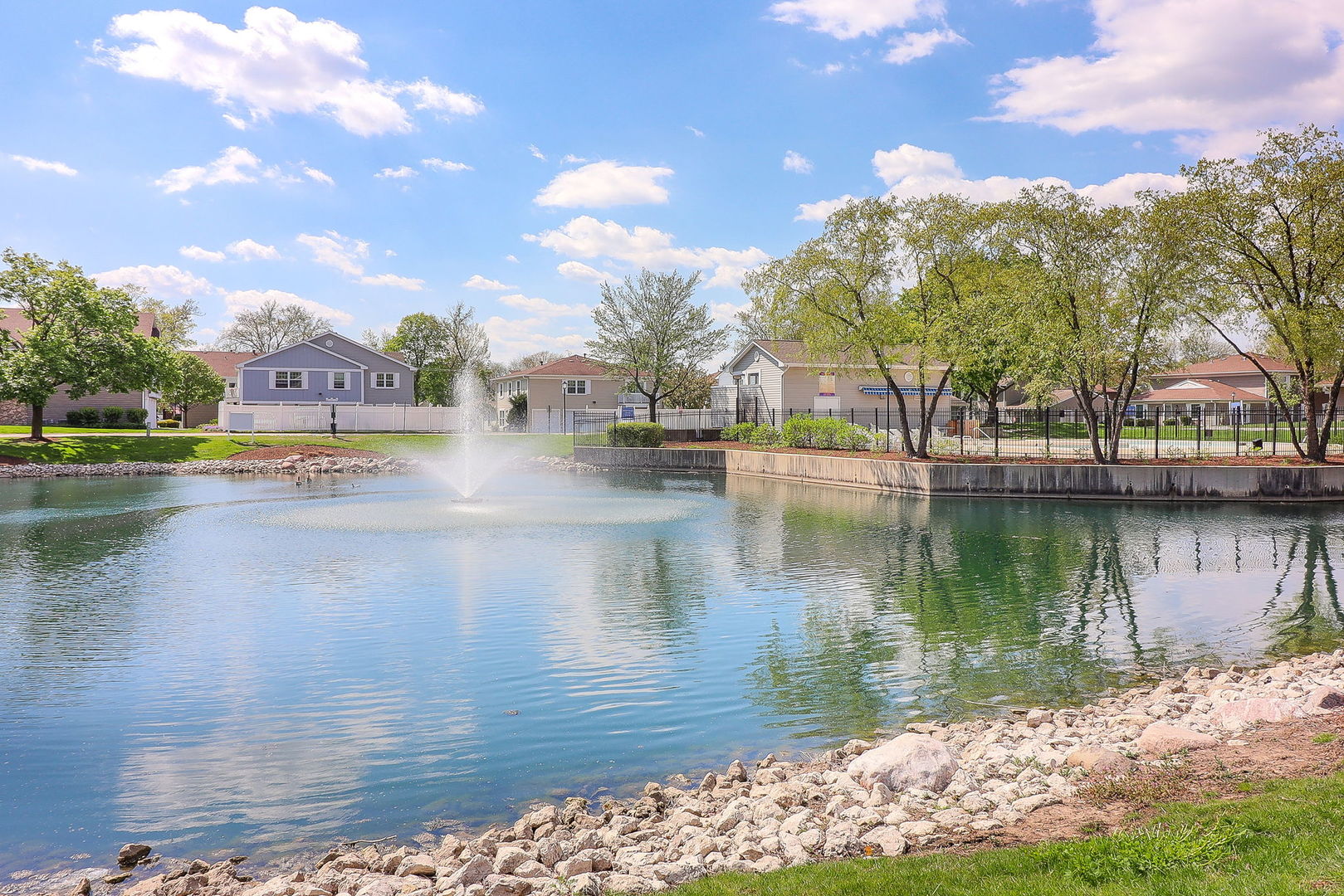 1482 Timber Trail, Unit B Wheaton, IL 60189 - Photo 16 of 20 a view of residential houses with outdoor space and lake view