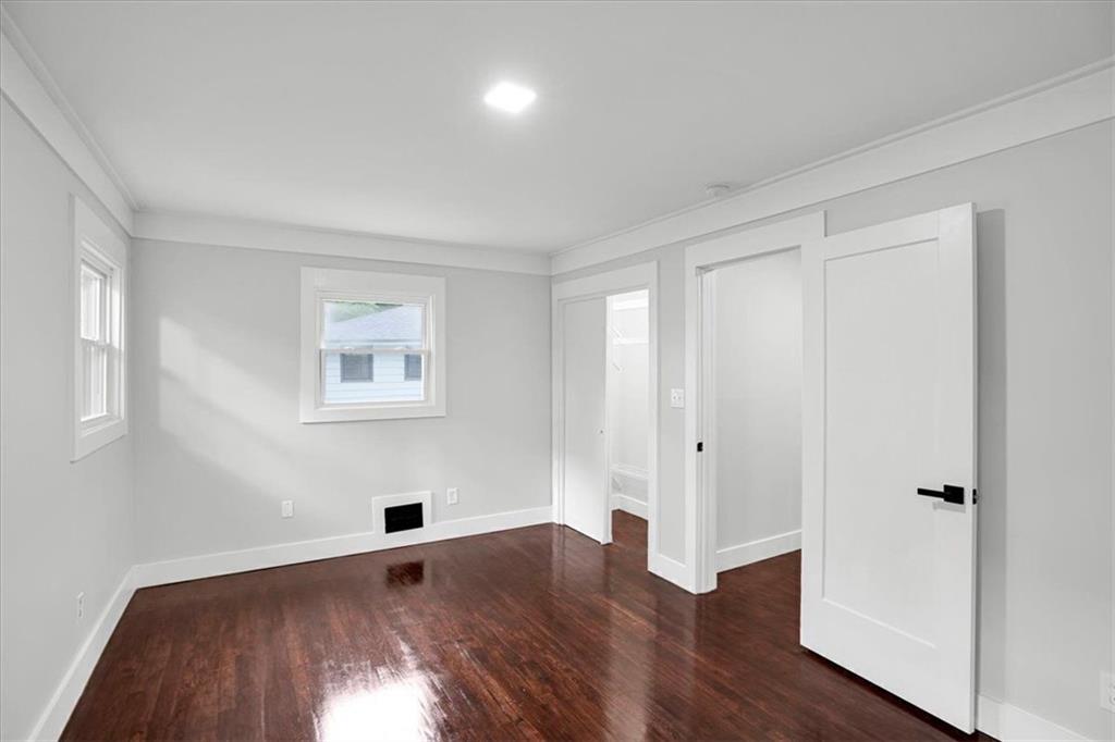 2271 Cresta Drive Decatur, GA 30032 - Photo 12 of 47 an empty room with wooden floor and windows