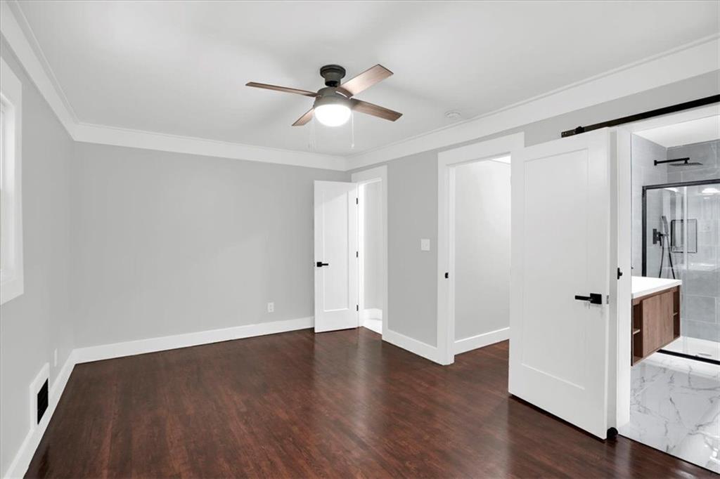 2271 Cresta Drive Decatur, GA 30032 - Photo 13 of 47 a view of a livingroom with wooden floor and white walls