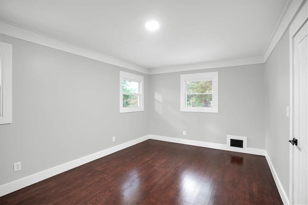 2271 Cresta Drive Decatur, GA 30032 - Photo 27 of 47 a view of a big room with wooden floor and windows