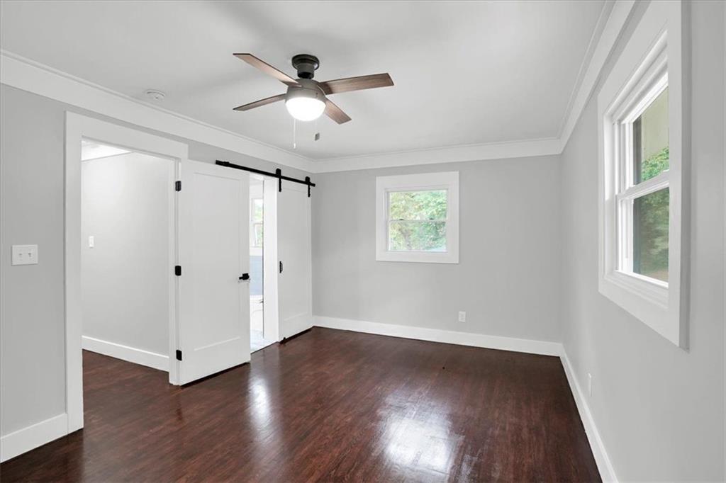 2271 Cresta Drive Decatur, GA 30032 - Photo 29 of 47 a view of empty room with wooden floor and fan