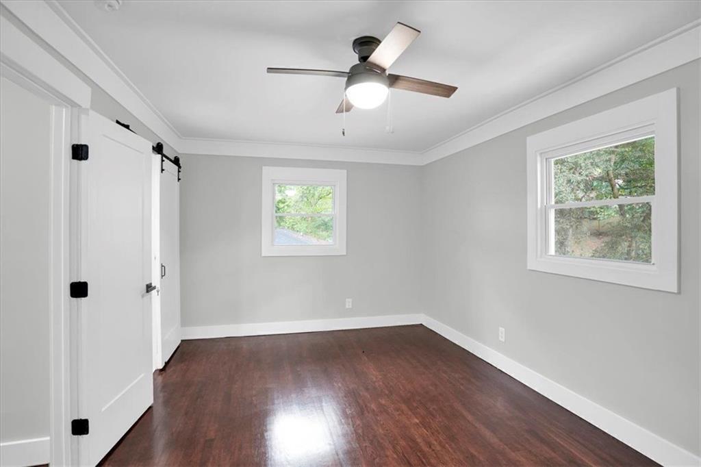 2271 Cresta Drive Decatur, GA 30032 - Photo 30 of 47 wooden floor in an empty room with a window