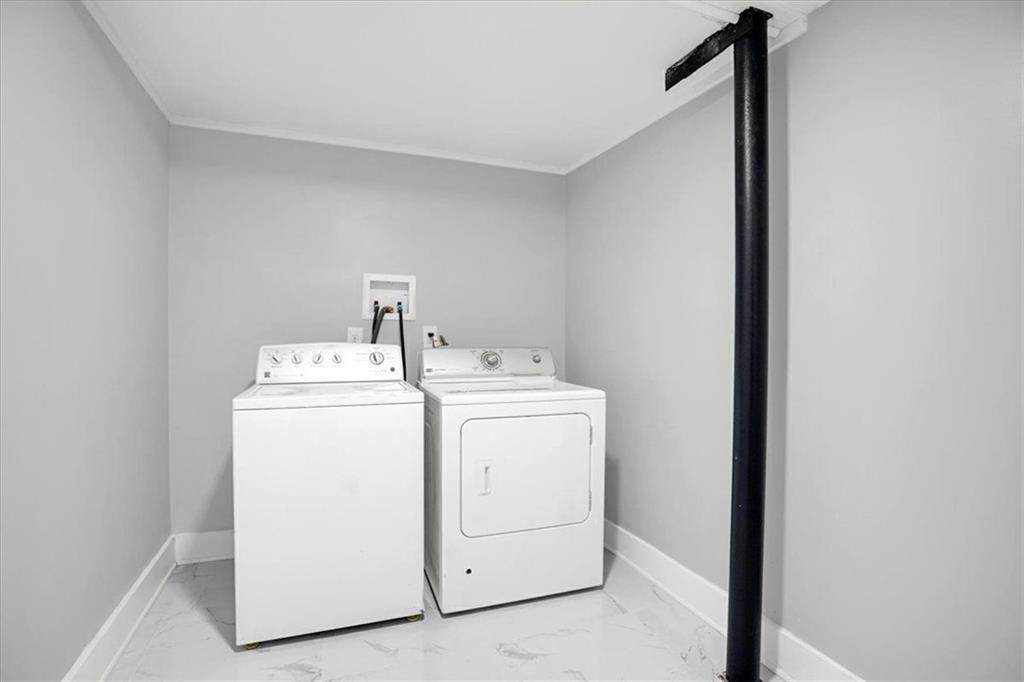 2271 Cresta Drive Decatur, GA 30032 - Photo 33 of 47 a utility room with dryer and washer