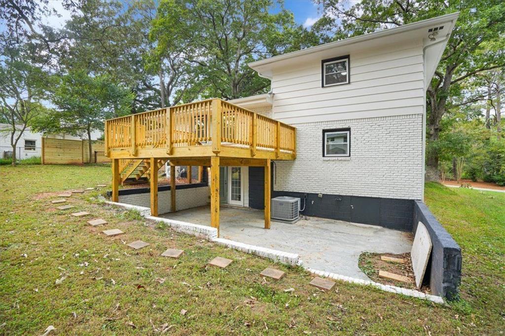 2271 Cresta Drive Decatur, GA 30032 - Photo 45 of 47 a view of a house with a yard and sitting area