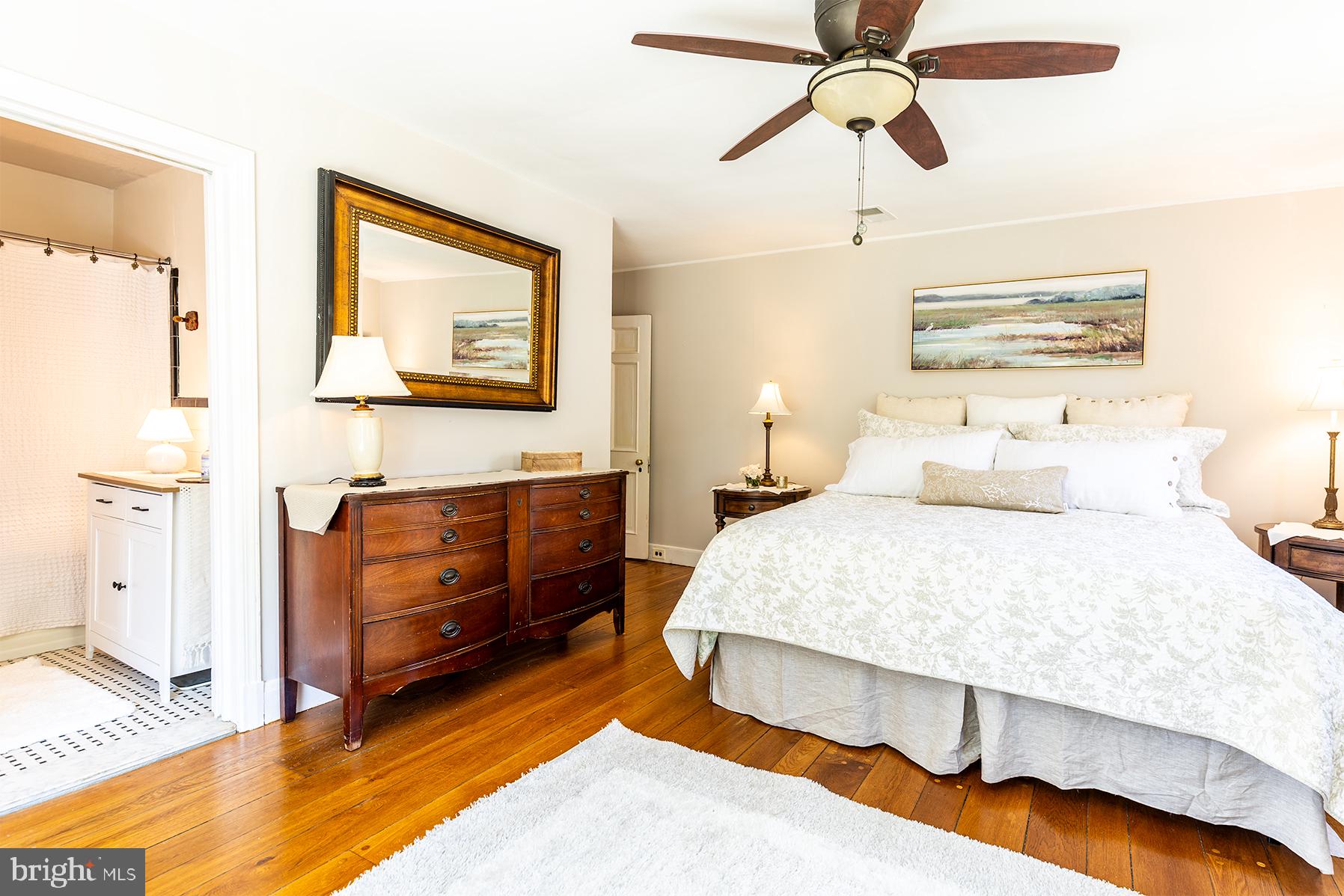 1438 Ridgeway East Arnold, MD 21012 - Photo 11 of 50 a bedroom with a bed and a chandelier