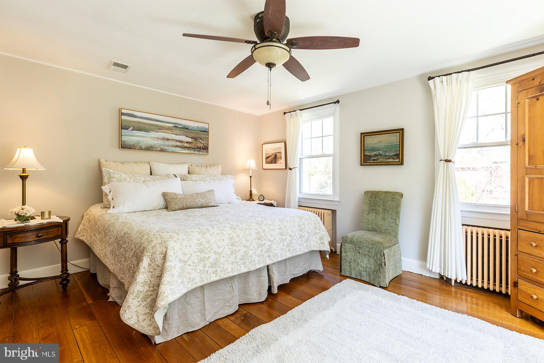 1438 Ridgeway East Arnold, MD 21012 - Photo 13 of 50 a bedroom with a bed and a chandelier