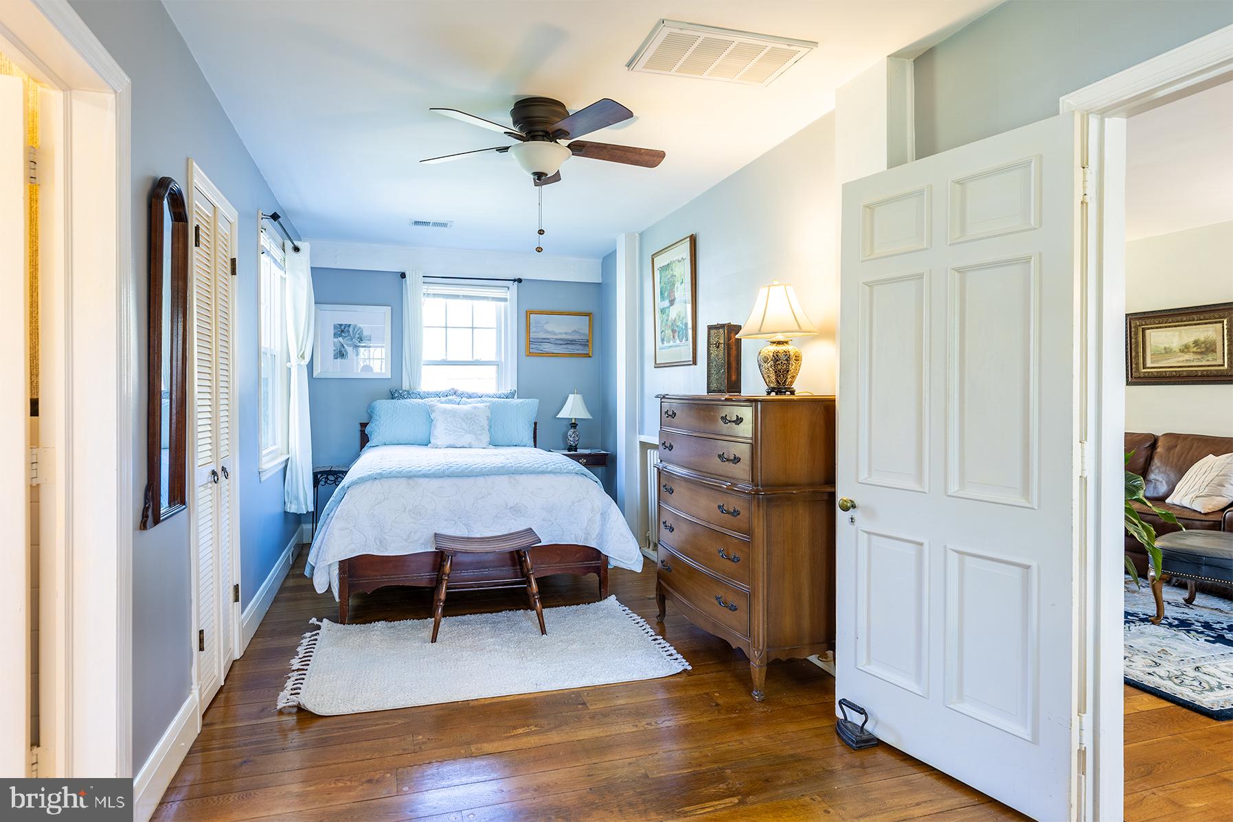 1438 Ridgeway East Arnold, MD 21012 - Photo 17 of 50 a bedroom with a bed and a chandelier