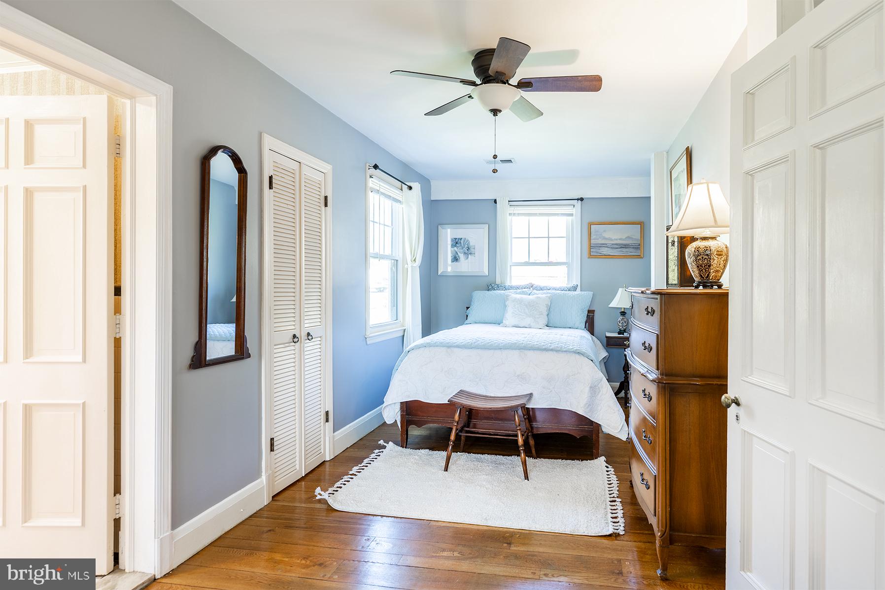 1438 Ridgeway East Arnold, MD 21012 - Photo 18 of 50 a bed room with a bed and a chandelier