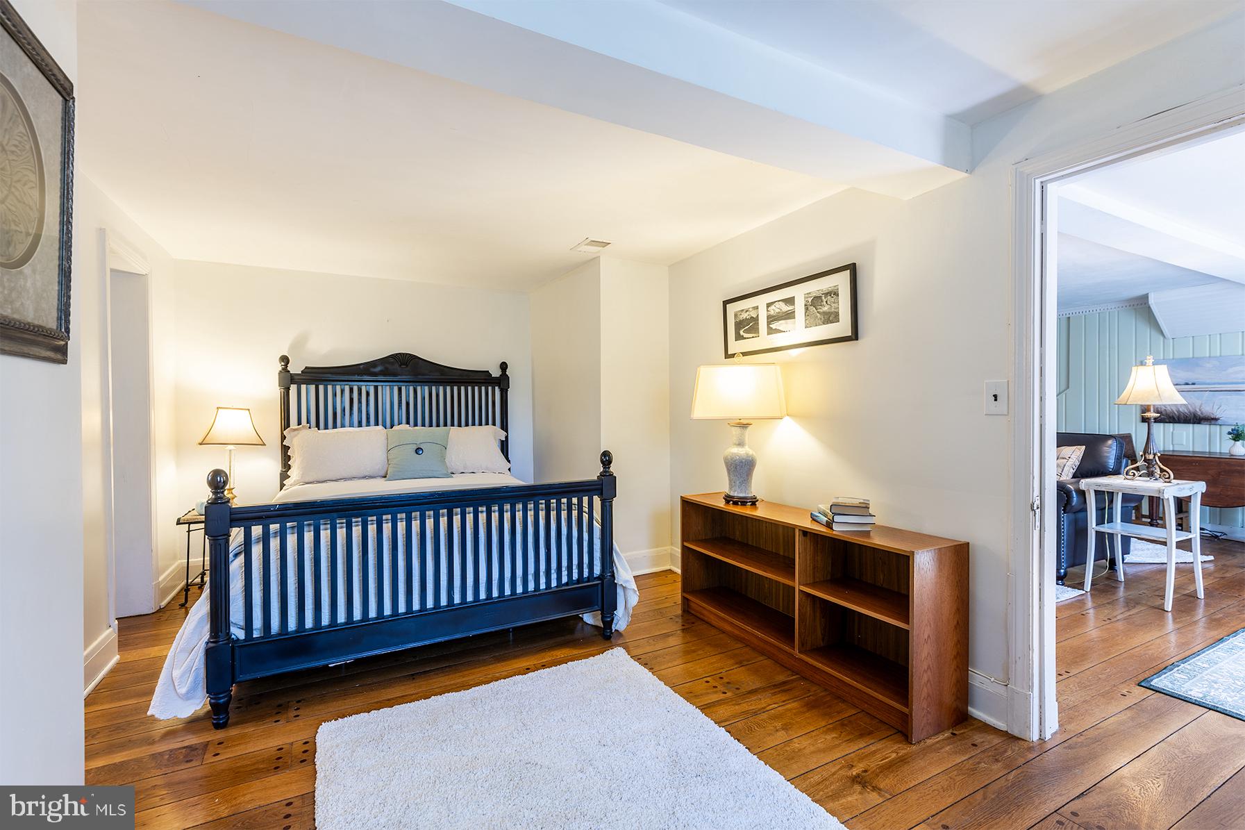 1438 Ridgeway East Arnold, MD 21012 - Photo 29 of 50 a bedroom with furniture and wooden floor