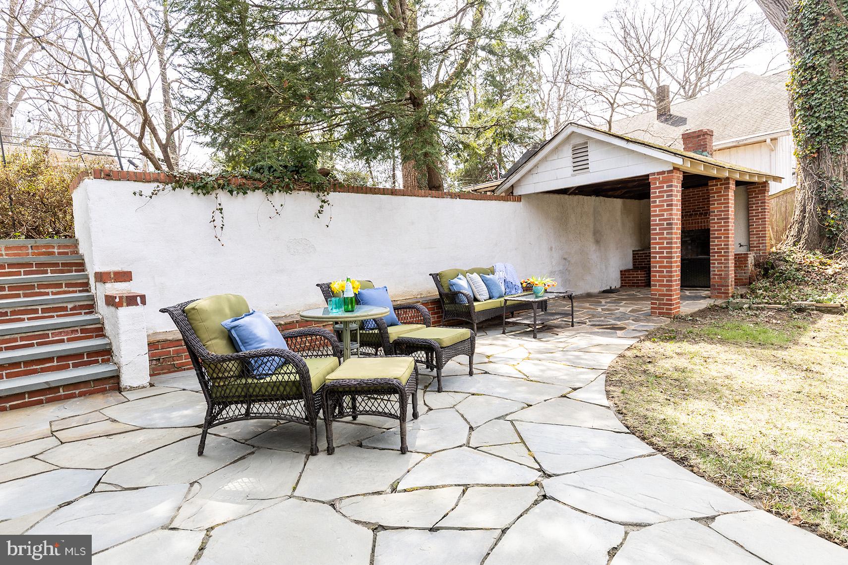 1438 Ridgeway East Arnold, MD 21012 - Photo 37 of 50 a backyard of a house with table and chairs