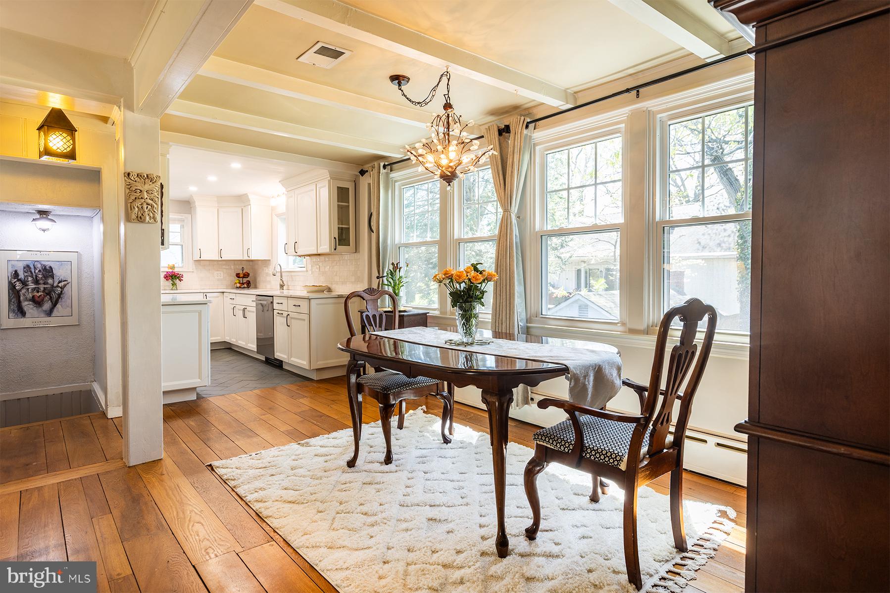 1438 Ridgeway East Arnold, MD 21012 - Photo 7 of 50 a view of a dining room with furniture window and wooden floor