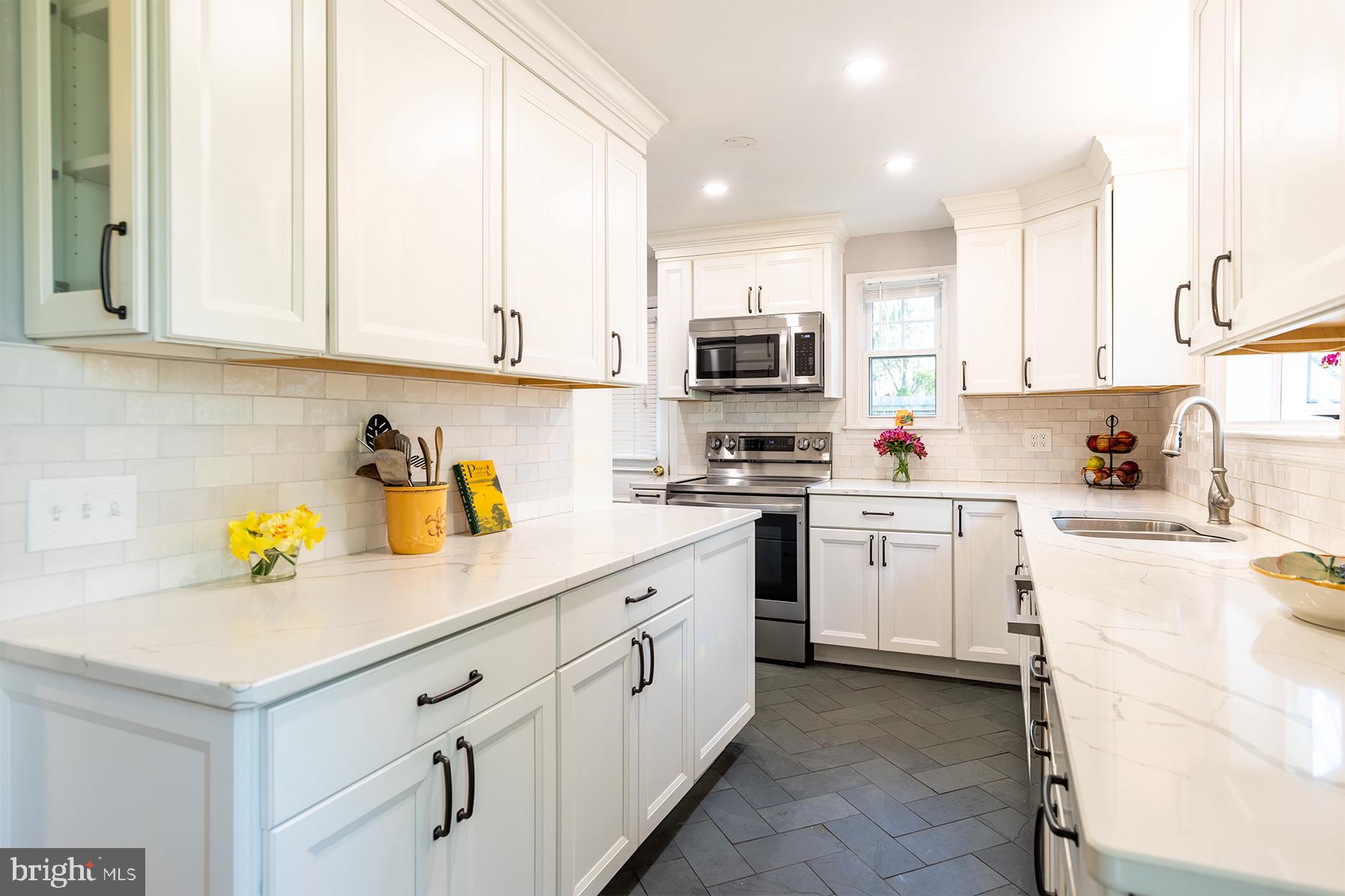 1438 Ridgeway East Arnold, MD 21012 - Photo 10 of 50 a kitchen with appliances a sink and cabinets