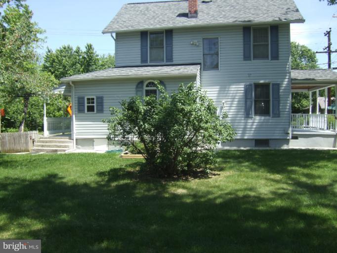 2 Hampton Road Linthicum Heights, MD 21090 - Photo 15 of 25 a front view of a house with a garden