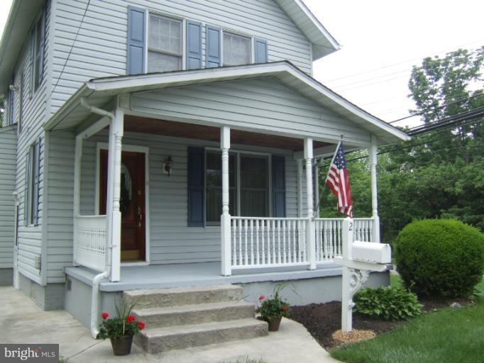 2 Hampton Road Linthicum Heights, MD 21090 - Photo 23 of 25 a front view of a house with a garden