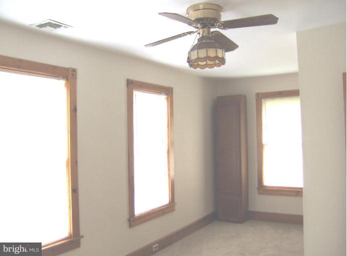 2 Hampton Road Linthicum Heights, MD 21090 - Photo 10 of 25 a view of an empty room with a window