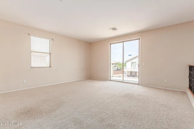 an empty room with windows