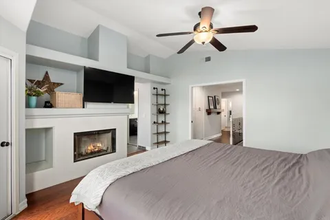 a view of a chairs in backyard of the house