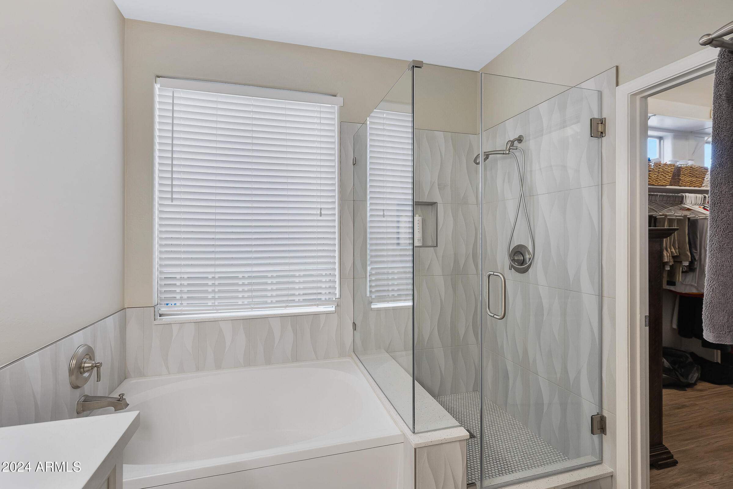 4741 East Timberline Road Gilbert, AZ 85297 - Photo 20 of 44 a bathroom with a bathtub and a shower
