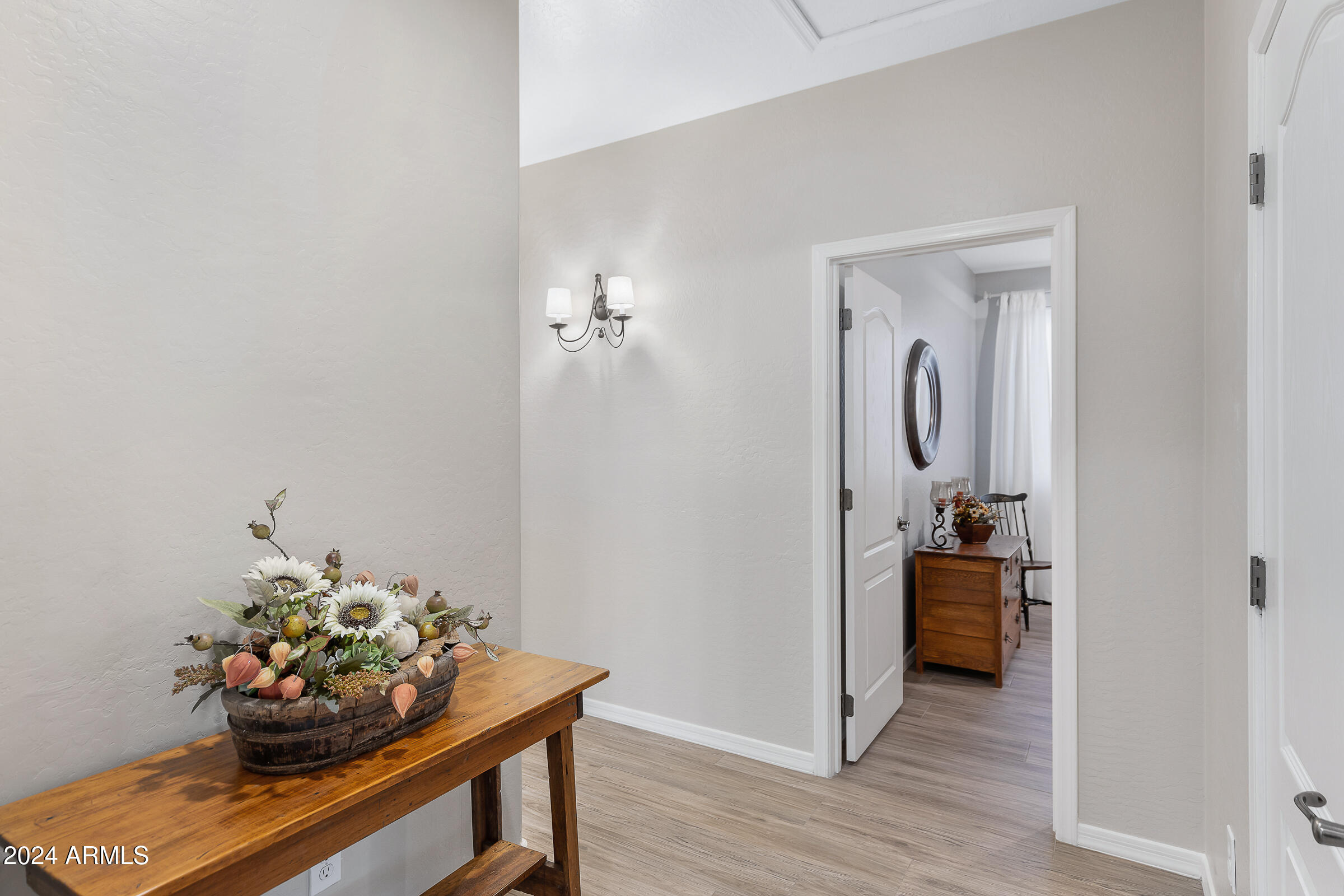 4741 East Timberline Road Gilbert, AZ 85297 - Photo 23 of 44 a room with furniture and flowers