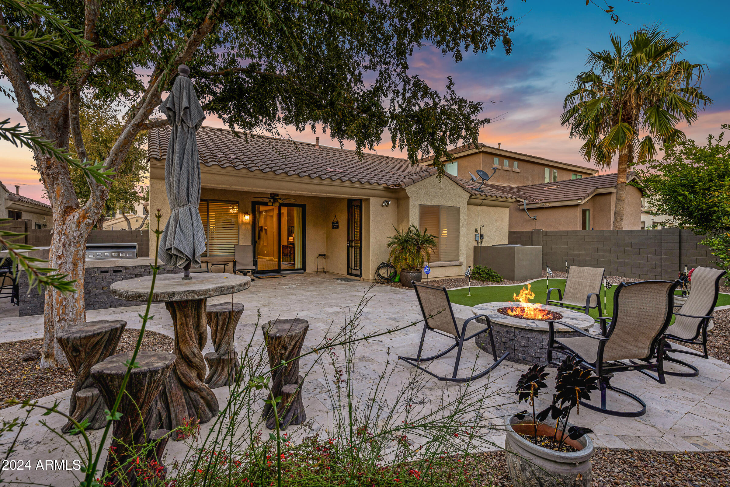 4741 East Timberline Road Gilbert, AZ 85297 - Photo 35 of 44 a view of house with backyard and outdoor seating