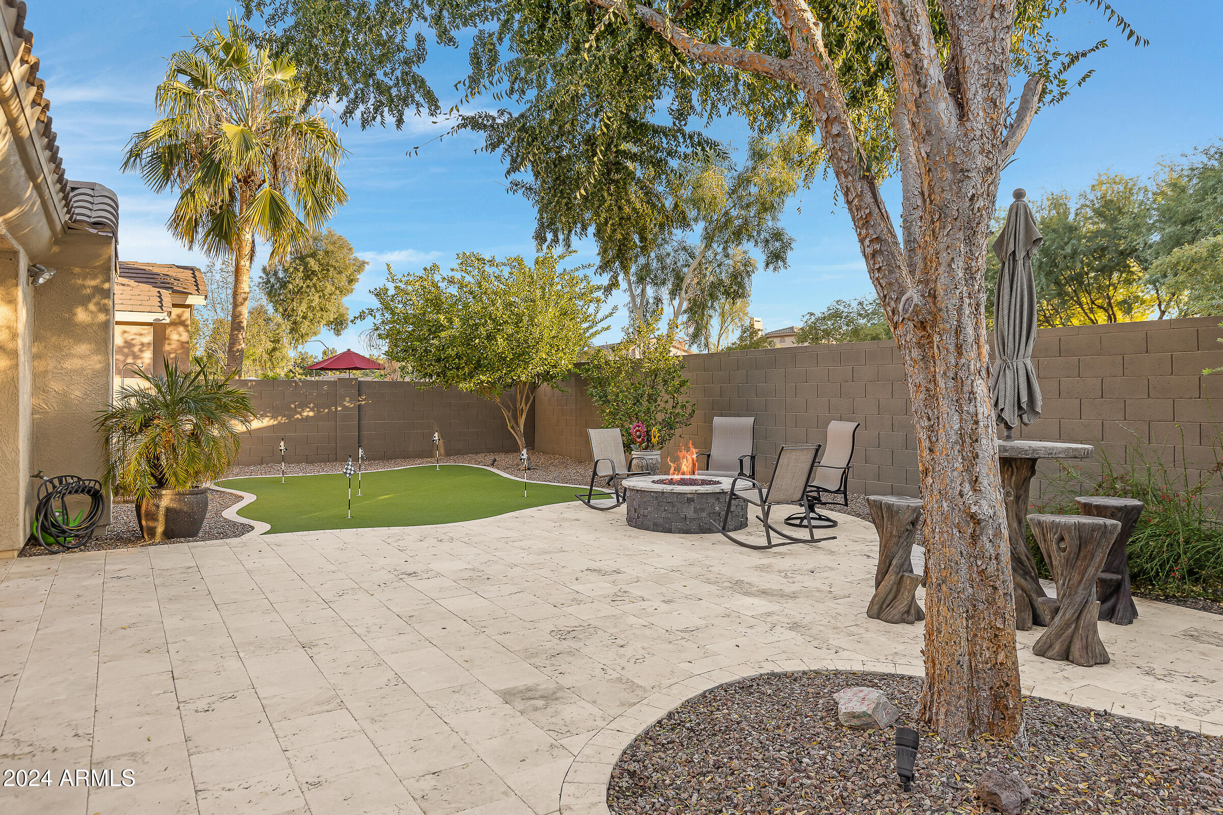 4741 East Timberline Road Gilbert, AZ 85297 - Photo 37 of 44 a view of a backyard with sitting area